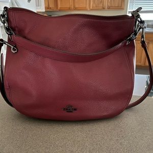 Used a few times Coach bag with strap
